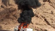 A burning vehicle is seen during a major assault against militants by Egyptian Army's soldiers in the troubled northern part of the Sinai peninsula in Al Arish, Egypt, in this undated handout picture made available by the Ministry of Defence, February 27,