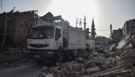 United Nations' aid convoy enters the Douma town of Eastern Ghouta after Assad Regime stopped the assaults in Damascus, Syria on March 05, 2018. (Mouneb Taim - Anadolu Agency)