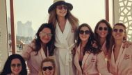 The last photo on Mina Barasan's Instagram account showed her surrounded by seven other young women, all wearing robes and sunglasses. The post, tagged #minasbachelorette, said it was taken at the One and Only Royal Mirage luxury hotel in Dubai.
