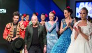 Models during a rehearsal prior to the Spring/Summer Fashion Festival to be started on Thursday at Mall of Qatar. 