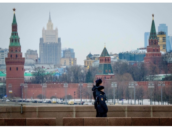 Police officers patrolling outside the Kremlin. AFP file photo.