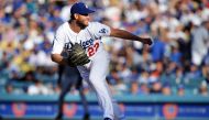 Los Angeles Dodgers starting pitcher Clayton Kershaw (22) throws against the San Francisco Giants in the fifth inning of the opening day game at Dodger Stadium. Gary A. Vasquez
