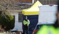 A police officer stands guard outside of the home of former Russian military intelligence officer Sergei Skripal, in Salisbury, Britain, March 8, 2018. REUTERS/Peter Nicholls