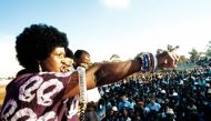A picture taken on April 13, 1986 shows Winnie Madikizela-Mandela, then-wife of South African president Nelson Mandela, addressing a meeting in Kagiso township.  AFP / Gideon Mendel
