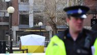 (FILES) In this file photo taken on March 06, 2018 a police tent is seen behind a cordon at the scene at The Maltings shopping centre in Salisbury, southern England, where former Russian spy Sergei Skripal and his daughter Yulia were found critically ill 