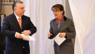 Hungarian Prime Minister Viktor Orban (L) and his wife Aniko Levai(R) vote at a polling station located ina school in Budapest on April 8, 2018. AFP / Attila Kisbenedek 