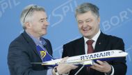 File photo: Ukrainian President Petro Poroshenko and Ryanair Chief Executive Michael O'Leary attend a ceremony to sign an agreement between Ukraine's Boryspil and Lviv airports and the Irish carrier Ryanair at Boryspil International Airport, outside Kiev,