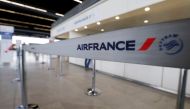 Air France logo is pictured at the Air France check-in at Bordeaux-Merignac airport, as Air France pilots, cabin and ground crews unions call for a strike over salaries in Merignac near Bordeaux, France April 7, 2018. REUTERS/Regis Duvignau
