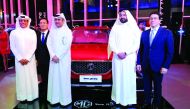 Hussain Ahmad Al Siddiqi, (second left) Deputy CEO, NBK; Sheik Nasser bin Nawaf, (second right), Second Deputy CEO; Ihab El Feky (right), Automotive Director, NBK Holding; and Tom Lee (second left), Managing Director of MG Motors, on the launch of MG new 