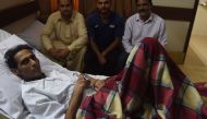 This photograph taken on April 22, 2018 shows Pakistani former field hockey goalkeeper Mansoor Ahmed being treated at a hospital in Karachi, following complications stemming from a pacemaker and stents implanted in his heart.  AFP / Rizwan Tabassum