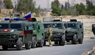 Russian military vehicles are seen in eastern Ghouta near Douma, in Damascus, Syria April 23, 2018. REUTERS/Ali Hashisho