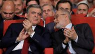Former Turkish President Abdullah Gul is seen with Saadet Party leader Temel Karamollaoglu during a ceremony in Istanbul, Turkey April 24, 2018. Picture taken April 24, 2018. REUTERS/Huseyin Aldemir