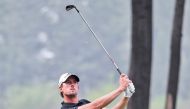 Alexander Bj?ork of Sweden plays a shot during the final round of the China Open in Beijing yesterday. 