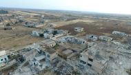 An aerial view of wreckages of structures after the airstrikes over Hola area in northern Homs in Syria on April 30, 2018.   Saer Homsi - Anadolu 
