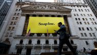 Signage for Snap Inc, parent company of Snapchat, adorns the front of the NYSE, March 2, 2017.  (Drew Angerer / Getty Images / AFP) 