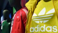The logo of Adidas is seen on a shirt in Herzogenaurach, southern Germany. German sportswear maker Adidas reported yesterday that efficiency savings had powered a leap in profits in the first quarter, staying confident of hitting its full-year targets as 