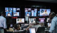 Representative image: Staff work in a control during a news program at NTV studios in Nairobi on February 6, 2018. (AFP / Yasuyoshi Chiba) 