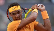 Spain's Rafael Nadal plays against Austria's Dominic Thiem during their ATP Madrid Open quarter-final tennis match at the Caja Magica in Madrid on May 11, 2018. / AFP / OSCAR DEL POZO