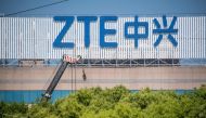 This picture taken on May 3, 2018 shows the ZTE logo on an office building in Shanghai. AFP / Johannes Eisele 