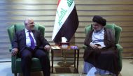 Iraqi Prime Minister Haider al-Abadi meeting with Iraqi Shiite cleric and leader Moqtada al-Sadr in Baghdad. AFP / IRAQI PRIME MINISTER'S PRESS OFFICE
