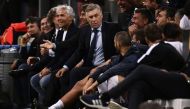 Carlo Ancelotti (C) looks on during the 