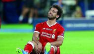 Liverpool's Mohamed Salah looks dejected after injury. Reuters/Hannah McKay