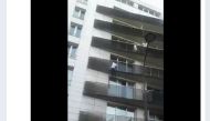 Screenshot of the video showing the 22-year-old climbing the building that is shared on social media.  