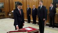Spain's new Prime Minister and Socialist party (PSOE) leader Pedro Sanchez swears in next to King Felipe during a ceremony at the Zarzuela Palace in Madrid, Spain, June 2, 2018. Fernando Alvarado/Pool via REUTERS