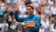 Spain's Rafael Nadal celebrates with the trophy after winning the final against Austria's Dominic Thiem (REUTERS/Pascal Rossignol)