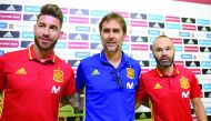 In this file photo taken on September 01, 2017 Spain’s coach Julen Lopetegui (centre) poses with Spain’s defender Sergio Ramos (left) and Spain’s midfielder Andres Iniesta prior to giving a press conference at the Royal Spanish Football Federation’s “Ciud