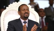 FILE PHOTO: Ethiopia's newly elected prime minister Abiy Ahmed attends a rally during his visit to Ambo in the Oromiya region, Ethiopia April 11, 2018. REUTERS/Tiksa Negeri/File Photo