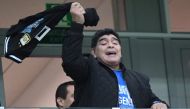 Argentina's football legend Diego Maradona gesturs from the grandstand before the Russia 2018 World Cup Group D football match between Argentina and Croatia at the Nizhny Novgorod Stadium in Nizhny Novgorod on June 21, 2018. AFP / Dimitar DILKOFF
