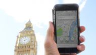 A photo illustration shows the Uber app on a mobile telephone, as it is held up for a posed photograph in central London, Britain, September 22, 2017. (Reuters / Toby Melville) 