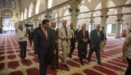 Duke of Cambridge Prince William (C) accompanied by officials of Jerusalem’s Jordan-run Authority for Islamic Endowments, visits holy sites in occupied East Jerusalem on June 28, 2018. (Faiz Abu Rmeleh/Anadolu Agency)