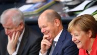German Chancellor Angela Merkel, Finance Minister Olaf Scholz and German Interior Minister Horst Seehofer attend a budget debate at the lower house of parliament Bundestag in Berlin, Germany, July 4, 2018. REUTERS/Hannibal Hanschke