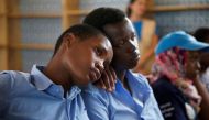 Burundian refugee school girls listen to Pakistani Nobel Peace Prize laureate Malala Yousafzai at the Mahama refugee camp, Rwanda, July 14, 2016. Reuters/Katy Migiro