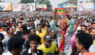 FILE PHOTO: Ethiopians carry their national flag during a rally in support of the new Prime Minister Abiy Ahmed in Addis Ababa, Ethiopia June 23, 2018. REUTERS/Maheder Haileselassie/File Photo