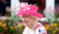 Britain's Queen Elizabeth II hosts the annual garden party at the Palace of Holyroodhouse in Edinburgh on July 4, 2018. / AFP / POOL / Jane Barlow