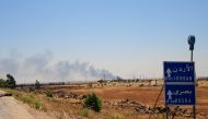 Smoke is seen over Deraa area, Syria July 5, 2018. Picture taken July 5, 2018. Sana/ Handout via Reuters
