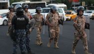Members of the Iraqi security forces are deployed in the capital Baghdad's Tahrir Square during demonstrations against unemployment on July 14, 2018. AFP / AHMAD AL-RUBAYE