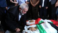 Hamas Political Bureau Head Ismail Haniyeh attends a funeral ceremony of Palestinian children Amir al-Nimra (15) and Louay Kahil (16) who lost their lives after Israeli army carried out airstrikes in Gaza City, Gaza on July 15, 2018. (Ashraf Amra/Anadolu 
