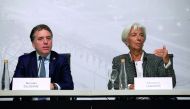 Argentina's Economy Minister Nicolas Dujovne (L) and International Monetary Fund (IMF) Managing Director Christine Lagarde offer a joint press conference in Buenos Aires, on July 21, 2018, in the framework of the G20 meeting of Finance Ministers and Centr