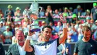 Fabio Fognini of Italy celebrates with the trophy after winning his final match against Richard Gasquet of France at the Swedish Open tennis tournament in Bastad, Sweden, on July 22, 2018. AFP / TT News Agency / Adam Ihse