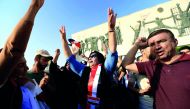 People shout slogans during a protest at Tahrir Square in Baghdad, Iraq July 27, 2018. Reuters/Thaier al-Sudani