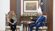Palestinian President Mahmoud Abbas meets with Freed Palestinian teenager Ahed Tamimi after she was released from an Israeli prison, in Ramallah in the occupied West Bank July 29, 2018. (PPO/Handout via REUTERS)