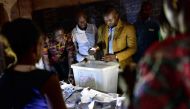 Electoral officials count ballot papers at the polling station on July 29, 2018 in Bamako, during Malian presidential elections. Mali went to the polls on July 29, 2018, with actual President seeking a second 5-year term in the fragile Sahel state beset b