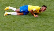 Brazil's Neymar lies on the pitch in match against Mexico at Mexico - Samara Arena, Samara, Russia - July 2, 2018. REUTERS/David Gray/File Photo