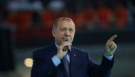 Turkish President Tayyip Erdogan makes a speech during a meeting of his ruling AK Party in Ankara, Turkey August 4, 2018. (Murat Kula/Presidential Palace/Handout via REUTERS)