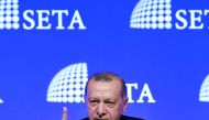 President of Turkey Recep Tayyip Erdogan gestures while addressing at a symposium organized by the Foundation for Political, Economic and Social Research (SETA) at the ATO Congresium Hall in Ankara, Turkey on August 14, 2018. ( Ra?it Aydo?an - Anadolu Age