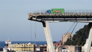 The collapsed Morandi Bridge is seen in the Italian port city of Genoa, Italy August 15, 2018. REUTERS/Stefano Rellandini